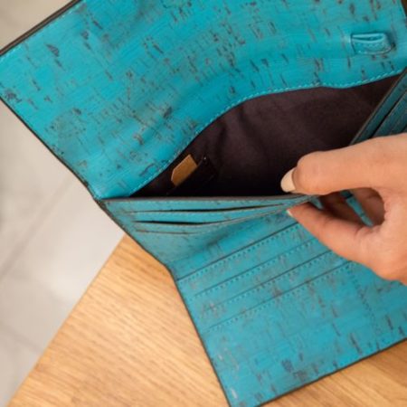 Ela Trifold Wallet Teal Inside Hand