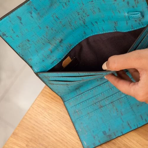 Ela Trifold Wallet Teal Inside Hand