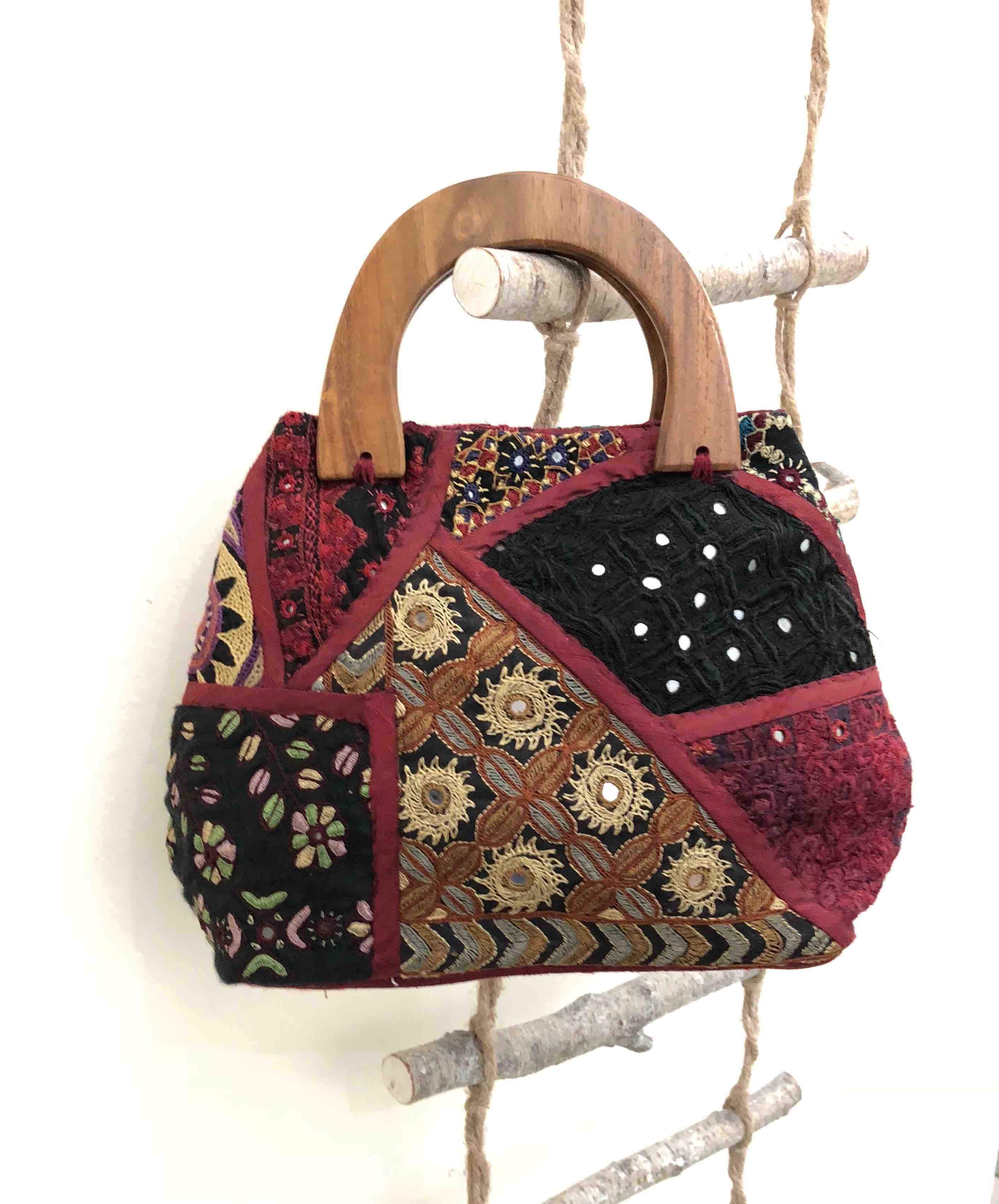 Handbags with wooden clearance handles